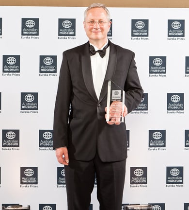 Dr David Moss, from the University of Sydney's School of Physics, with an international team of scientists, has created a new form of ultra small laser that will revolutionise many fields. (Here Dr Moss is seen winning the 2011 Australian Museum Eureka Prize for Innovation in Computer Science.)